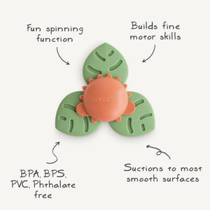 Dino Suction Spinner Toy for babies, colorful bath toy with suction base, engaging playtime at angle 2.