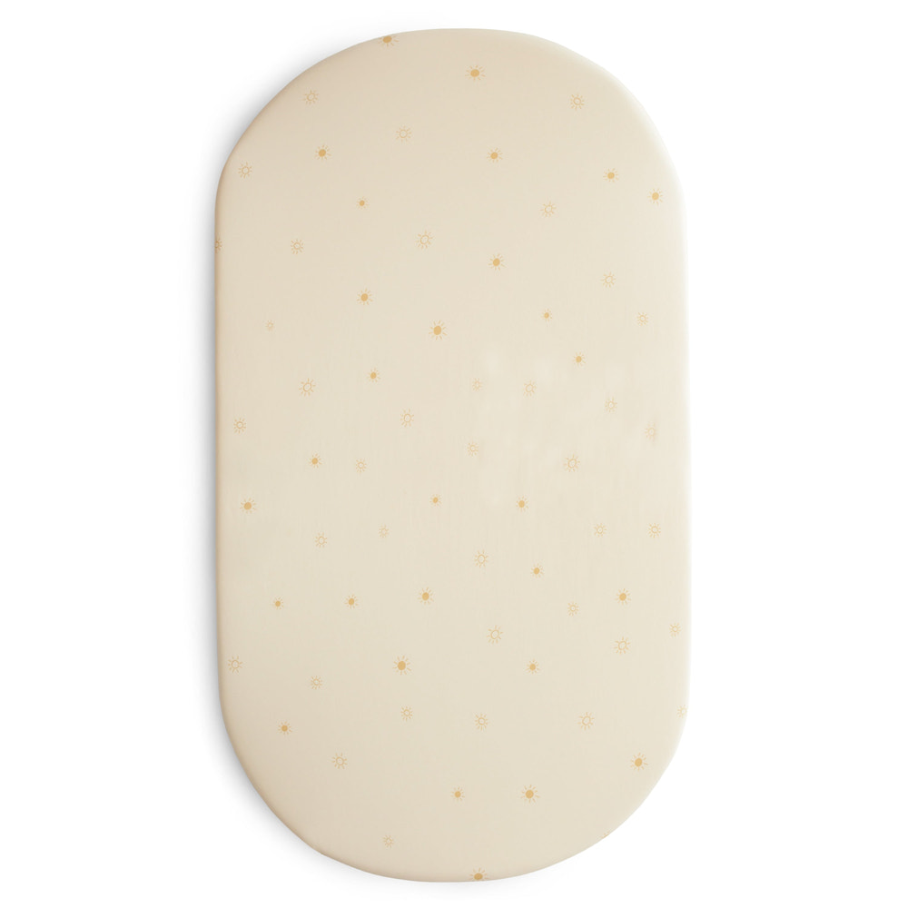 Soft stretchy bassinet sheet in soothing colors, perfect for a cozy and comfortable sleep environment for your baby.