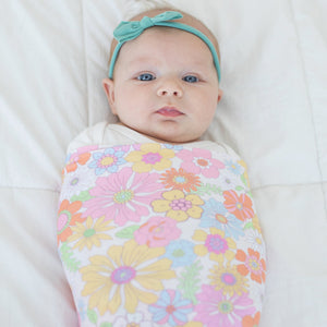 Retro floral baby swaddle blanket in angle 3, perfect for cozy and stylish infant wraps.