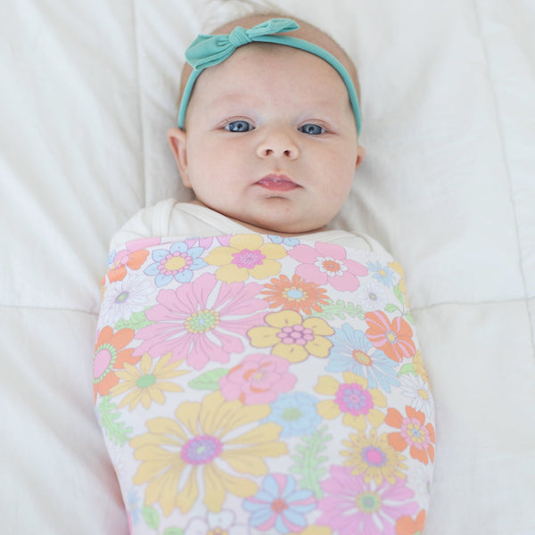 Retro floral baby swaddle blanket in angle 3, perfect for cozy and stylish infant wraps.