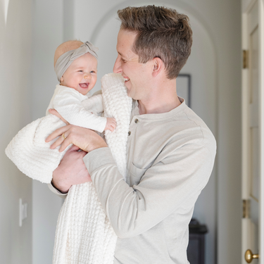 Soft waffle knit receiving blankets for babies in soothing colors, perfect for swaddling and comfort.