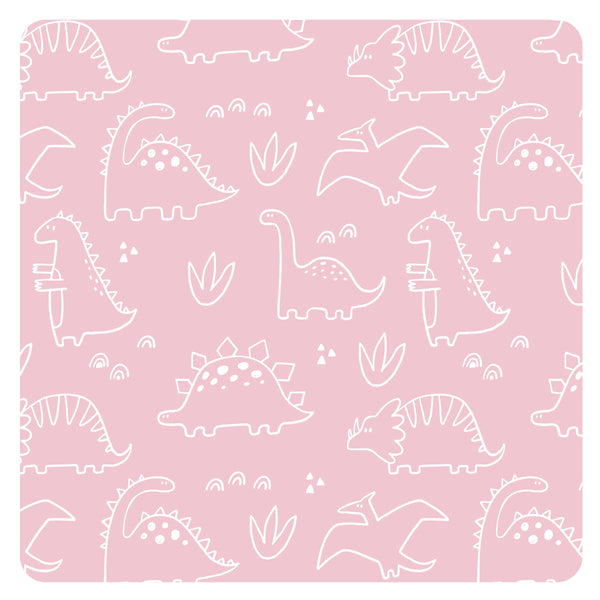 Blush Dino Friends Bapron for babies, angled view showcasing playful dinosaur design and practical bib features.