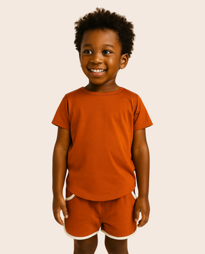 All-Day Tee in Chili for babies, showcasing a vibrant red color from angle 2. Perfect for everyday wear.