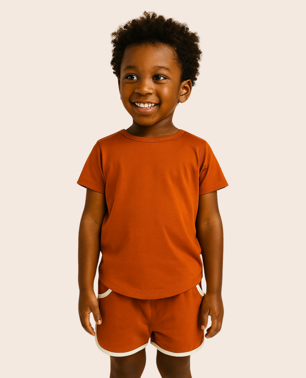 All-Day Tee in Chili for babies, showcasing a vibrant red color from angle 2. Perfect for everyday wear.