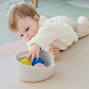 Tiny Land® Montessori Early Skills Baby Set for 7-12 months, showcasing engaging toys for infant development.