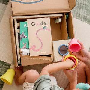 Tiny Land® Montessori Complete Baby Set for infants 0-24 months, showcasing safe and engaging playtime essentials.
