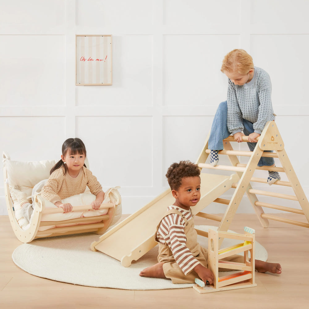 Tiny Land® 7-in-1 Montessori Climbing Set with Play Pad for babies and toddlers, promoting active play and development.