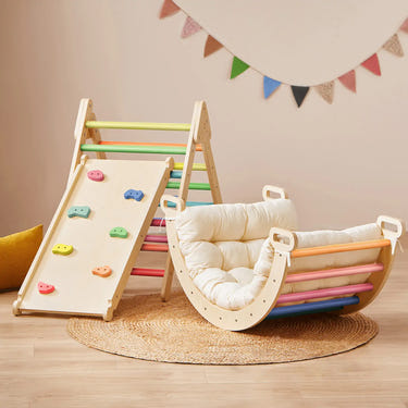 Tiny Land® 7-in-1 Rainbow Climbing Set with Play Pad for active play and development in babies and toddlers.