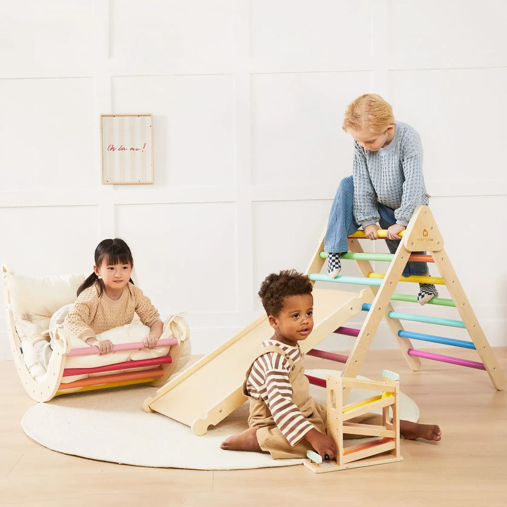 Tiny Land® 7-in-1 Rainbow Climbing Set with Play Pad for active play and development in babies and toddlers.