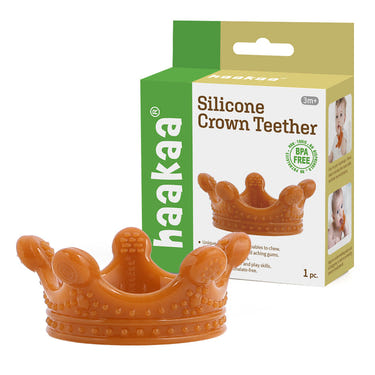 Haakaa Silicone Crown Teether in Amber - Safe, stylish pacifier for soothing babies' gums.
