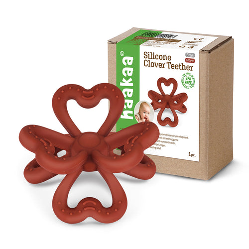 Haakaa Silicone Clover Teether in angle view, perfect for soothing baby's gums and promoting healthy teething.