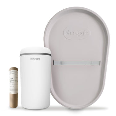 Shnuggle Changing Essentials Kit: Mat, Diaper Pail, and Liners for hassle-free diaper changes.