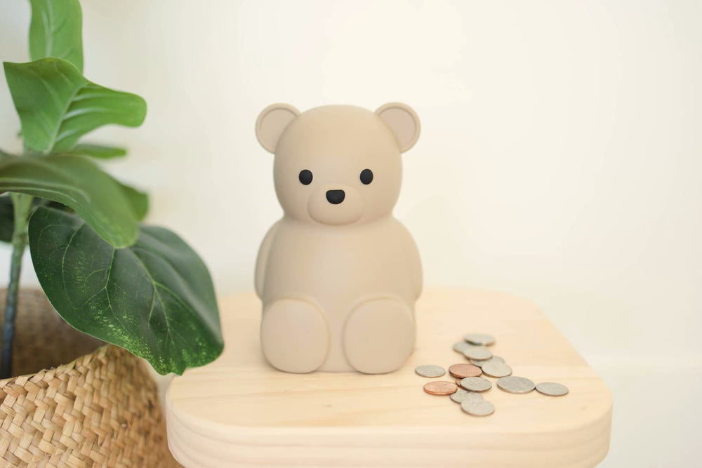 Teddy Bear Money Bank for kids - a cute and fun way to save money while enjoying playtime.