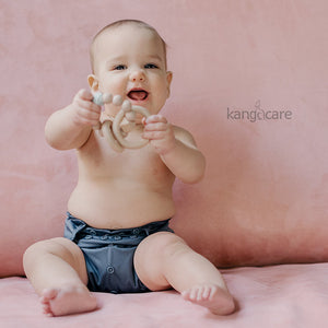 Rumparooz Castle One Size Cloth Diaper Cover at an angle, perfect for eco-friendly baby bedding and sleep solutions.