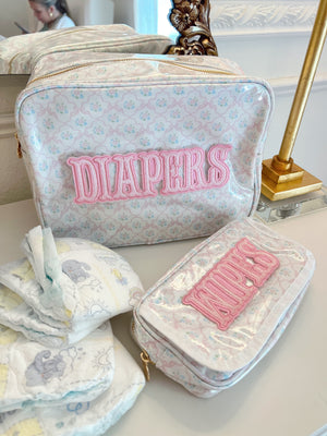 XL Diapers in a Clear Coat Travel Bag, showcasing angle 6 for easy access and organization on the go.