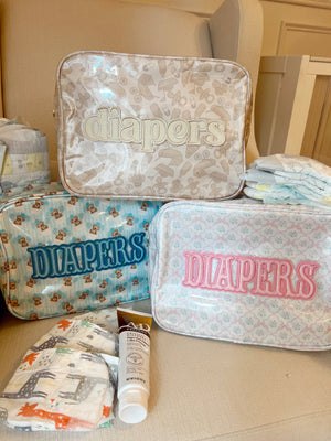 XL Diapers in a clear coat travel bag, perfect for on-the-go convenience and organization for your baby essentials.