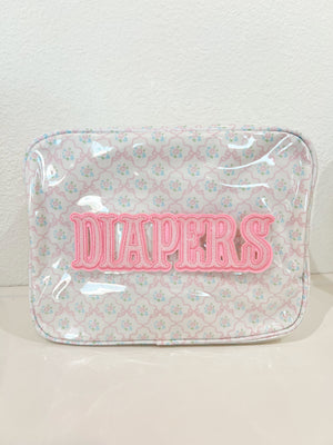 XL Diapers in a clear coat travel bag, showcasing convenience and portability for parents on the go.