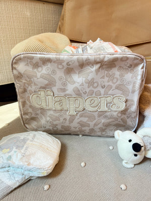 XL Diapers in a clear coat travel bag, showcasing angle 5 for easy access and portability.