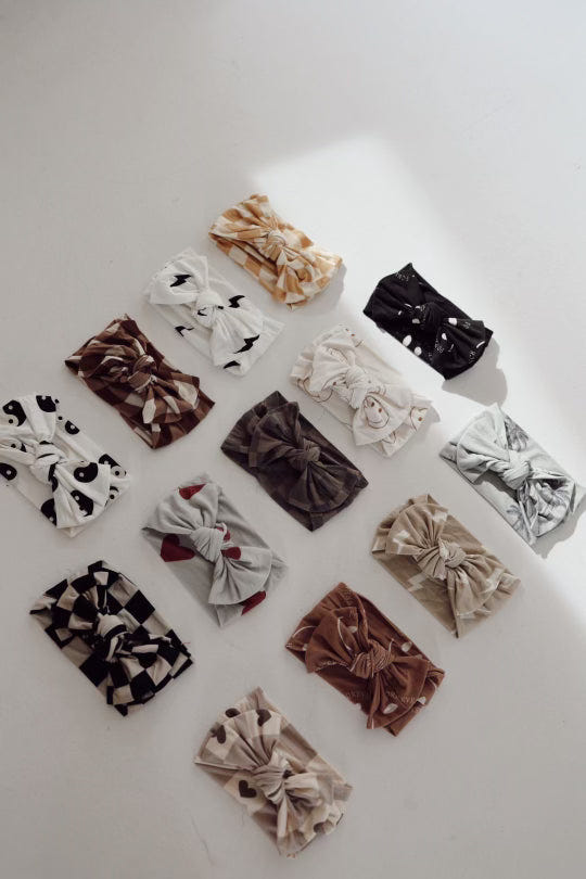Bamboo head wrap for babies by Just Smile, soft and stylish accessory for little ones.