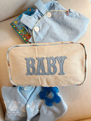 Large canvas travel bag for babies, shown at angle 7, perfect for outings and diaper storage.