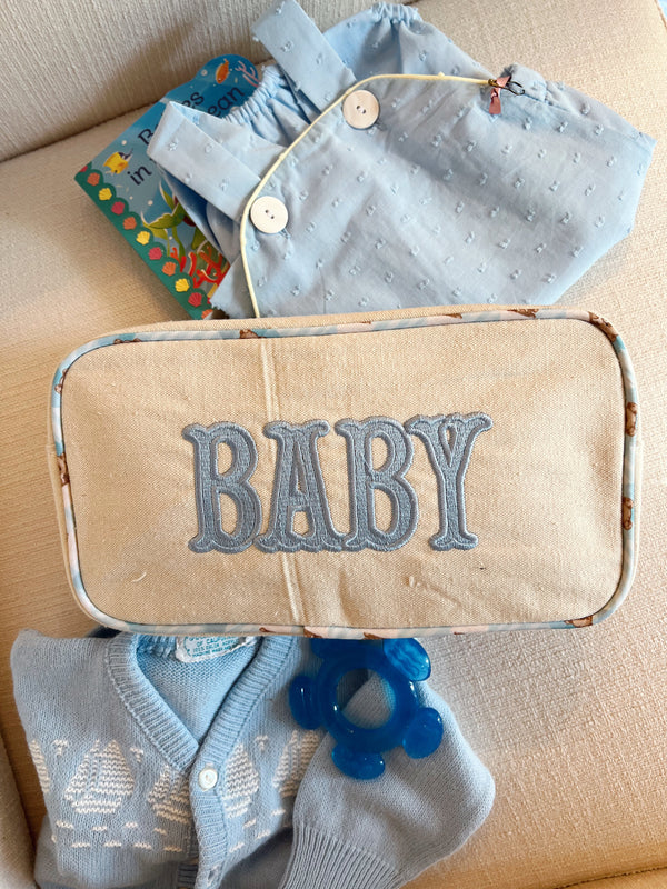 Large canvas travel bag for babies, shown at angle 7, perfect for outings and diaper storage.