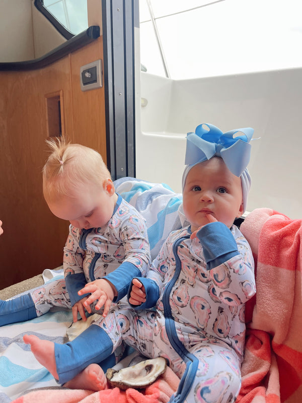 Blue Oysters Bamboo Sleeper pajamas for babies, angle view showcasing soft fabric and cute design.