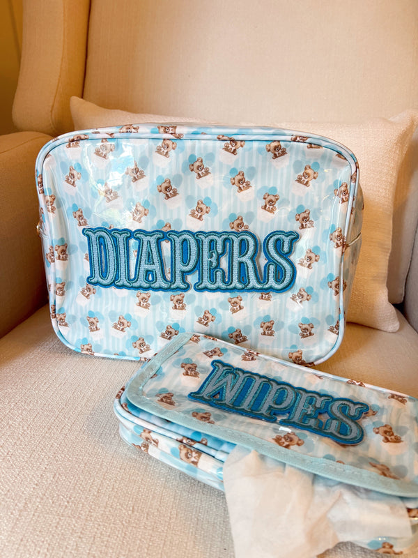 "XL Diapers in a clear coat travel bag, angled view showcasing convenience and portability for parents on the go."