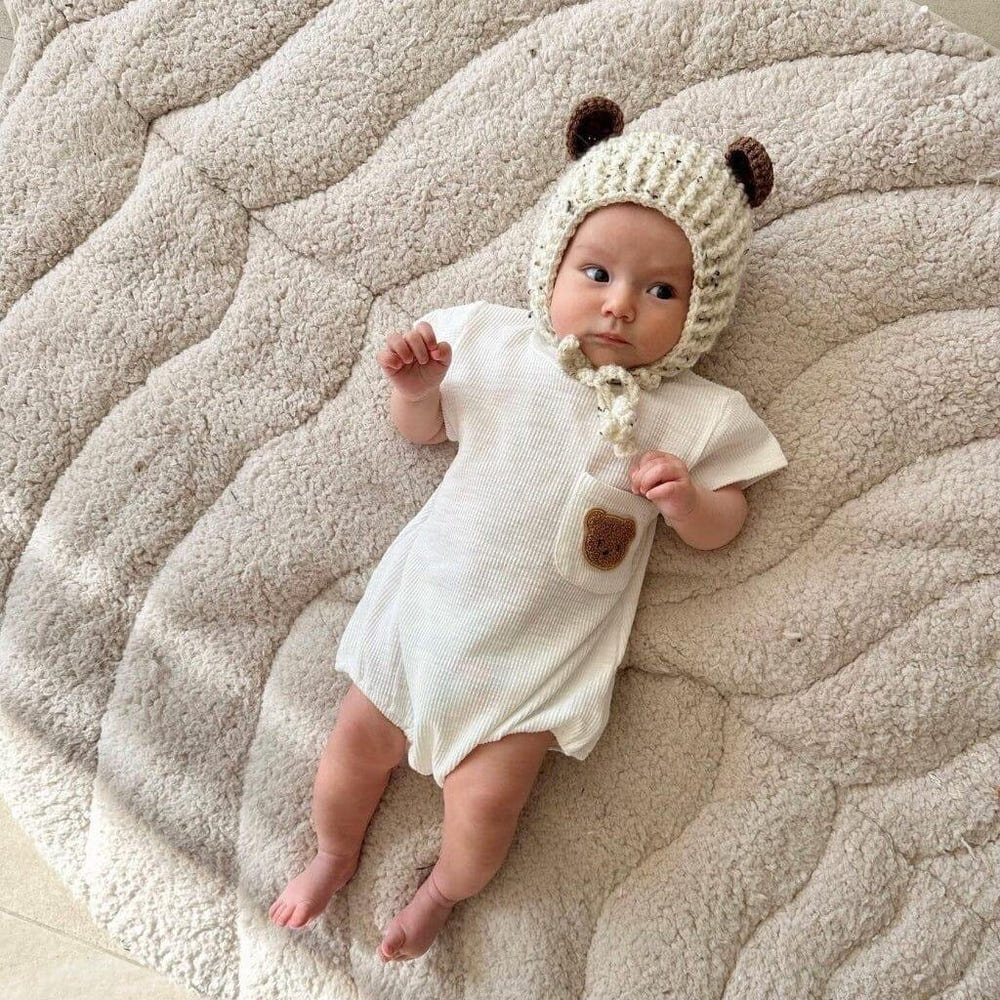Leaf-shaped pearl baby playmat made of soft sherpa and cotton, perfect for playtime and tummy time.