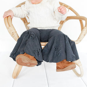 Distressed denim baby bell bottoms, stylish and comfy, perfect for little ones. Angle 3 view showcasing design details.