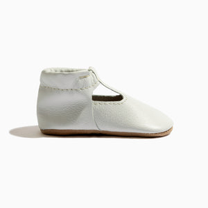 Toasted Bright White T-Bar Baby Shoe from angle 3, featuring a stylish and comfortable design for little feet.