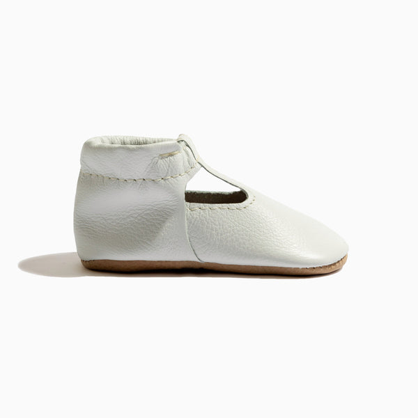 Toasted Bright White T-Bar Baby Shoe from angle 3, featuring a stylish and comfortable design for little feet.