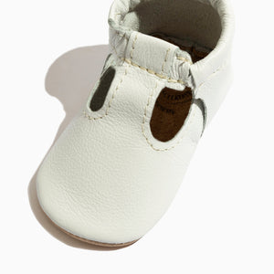 Toasted Bright White T-Bar Baby Shoe from angle 2, perfect for stylish and comfortable baby footwear.