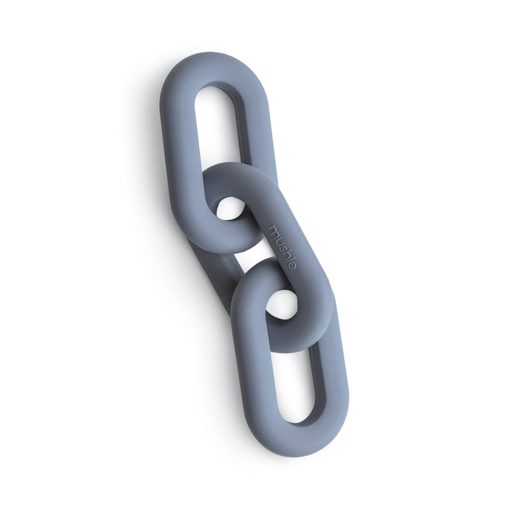 Links Teether - colorful, safe silicone teething toy for babies, designed for soothing sore gums and promoting oral development.