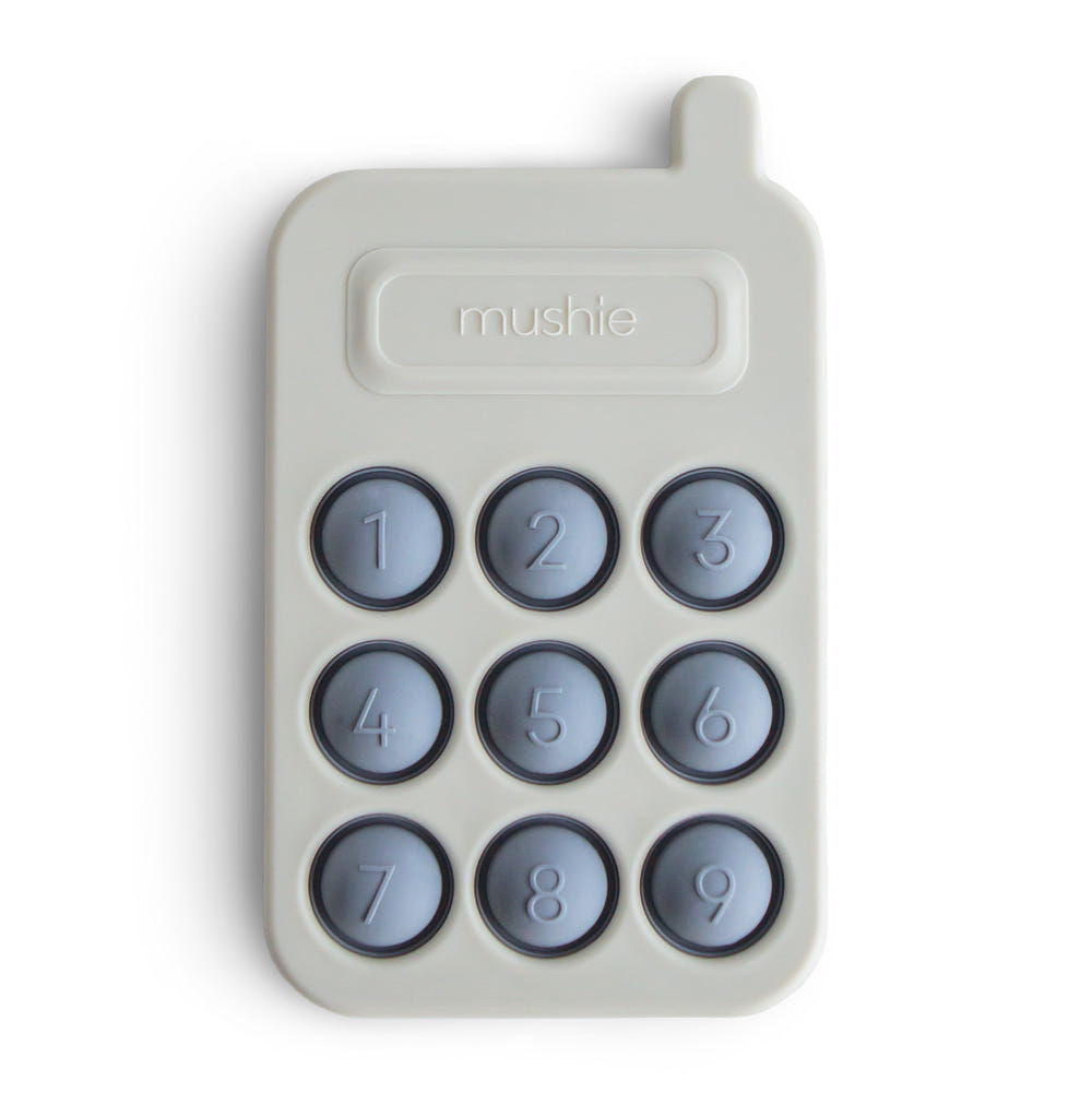Colorful phone press toy for babies, promoting sensory play and fine motor skills development.