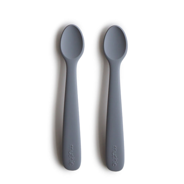Silicone feeding spoons for babies, angled view showcasing soft, safe design for easy feeding.