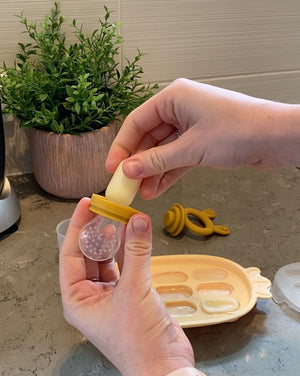 Haakaa Silicone Nibble Tray in angle 3 view, perfect for baby feeding and snack time. Safe and easy to clean.