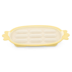 Haakaa Silicone Nibble Tray in angle view, perfect for baby feeding and snack time. Safe and easy to clean.