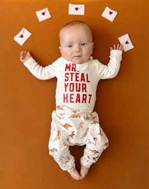 Valentine's Day Mr. Steal Your Heart Dino Jogger Outfit for babies, two-piece set, playful design, angle view.