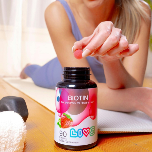 Biotin 10,000 mcg strawberry supplement for babies, angle 7 view showcasing vibrant packaging and product details.