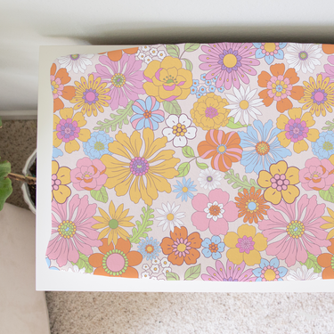 Retro floral changing pad cover for stylish and comfortable diaper changes. Perfect for nursery decor.