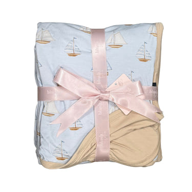 Soft sailboats blanket for babies, perfect for cozy swaddling and nursery decor.