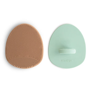 Cradle cap brushes for gentle scalp care, perfect for soothing baby's sensitive skin.