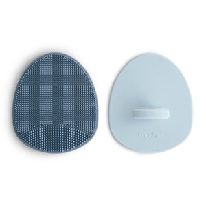 "Cradle cap brushes for gentle baby scalp care, angled view showcasing soft bristles and ergonomic design."