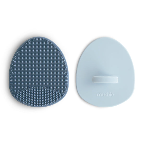 "Cradle cap brushes for gentle baby scalp care, angled view showcasing soft bristles and ergonomic design."