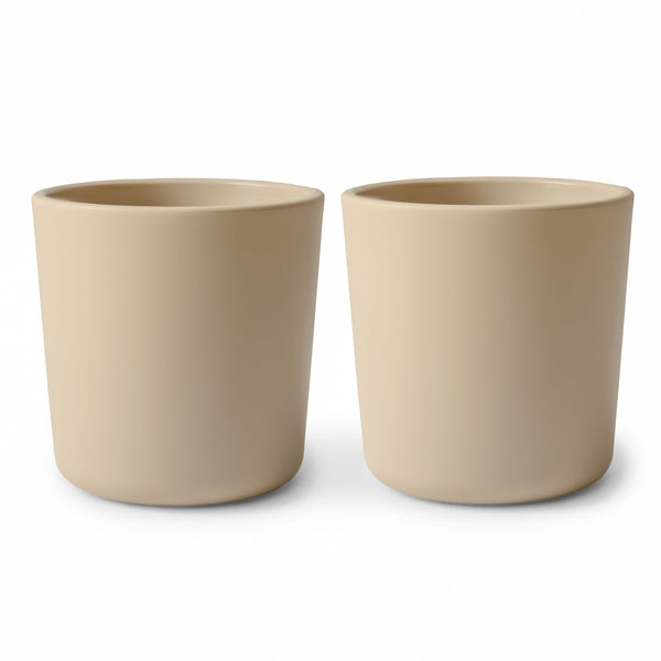 Colorful baby dinnerware cups in various sizes, perfect for mealtime fun and learning. Angle 3 view.