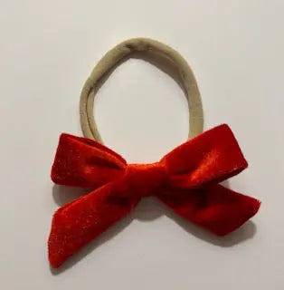 Soft velvet baby bows for girls, perfect accessory for stylish infants.