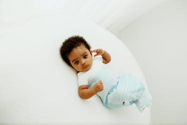 Blue Arms Out™ Short Sleeve Sleep Sack for babies, featuring a soft blue design for comfortable sleep.