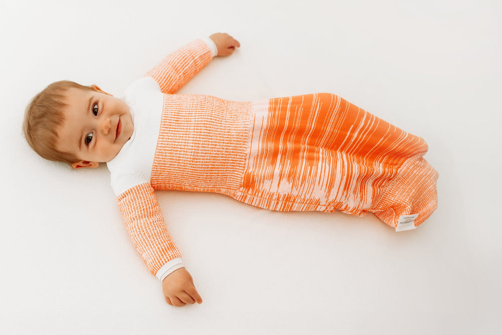 Orange Arms Out™ Long Sleeve Sleep Sack for babies, featuring a cozy design in vibrant orange for comfortable sleep.