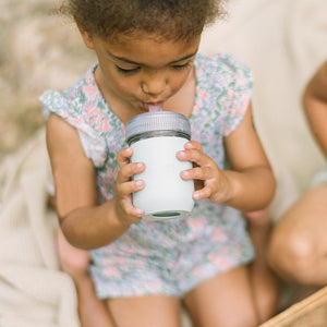Silicone sleeve 2 pack for baby cups, providing grip and protection, displayed at angle 13.