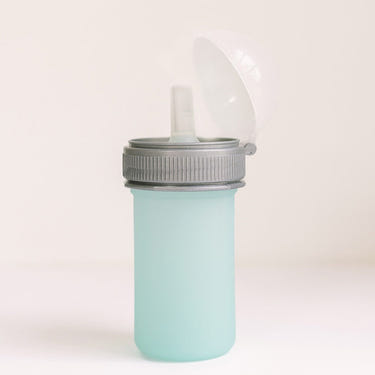 Silicone squeeze pouch for easy baby feeding, durable and reusable feeding utensil.